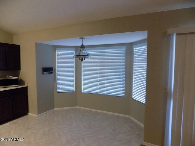 Building Photo - 9081 E Aster Dr