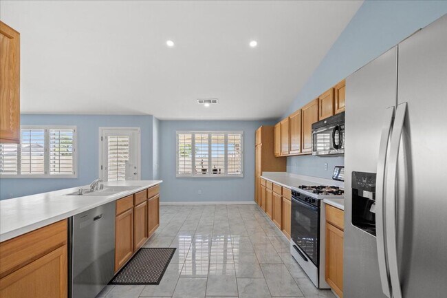 Building Photo - Multiple Living Areas 4-Bedroom Retreat with Vaulted Ceilings & No Carpet