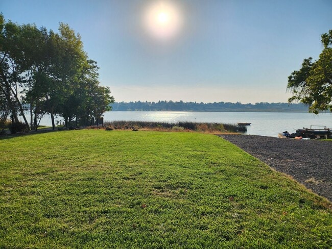Primary Photo - Lake house with Shop on 1/2 acre