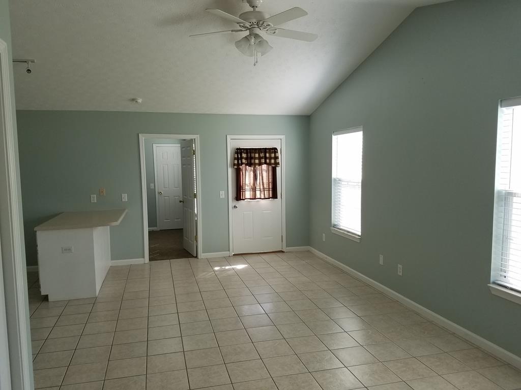 Living area with tile floor - 736 Jones Homestead Rd