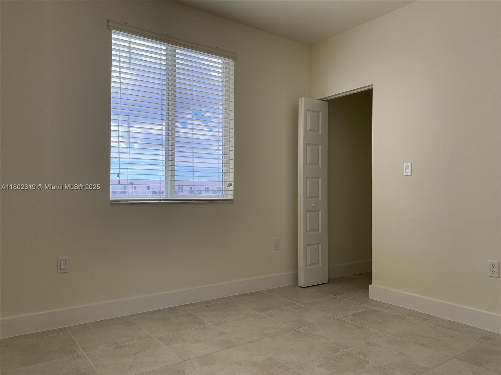 Building Photo - 6455 NW 103rd Pl