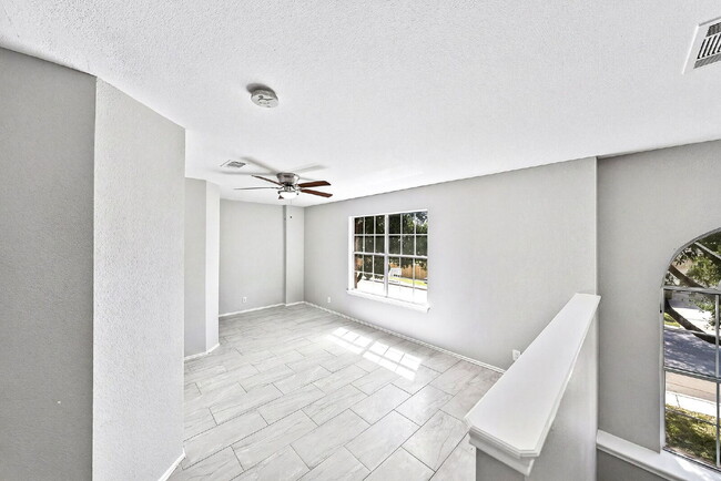 Building Photo - A Waterfall Shower, a Sunroom, and a Story Worth Coming Home To