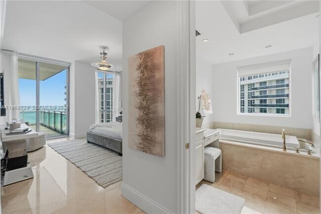 Building Photo - 10295 Collins Ave