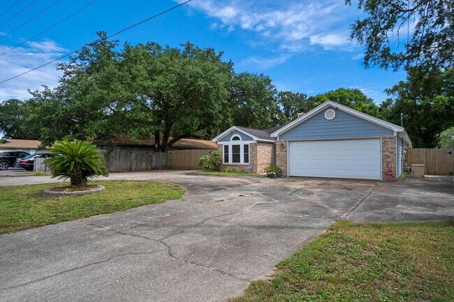Building Photo - Featuring 3 spacious bedrooms and 2 full b...