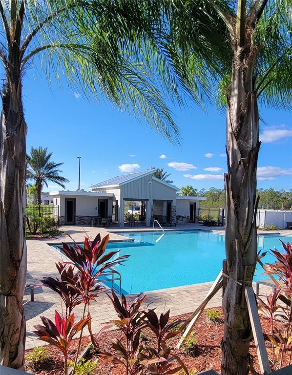 Building Photo - 5126 Magnolia Palm Dr