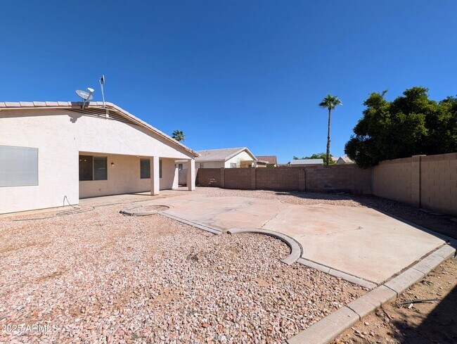 Building Photo - 3028 N 109th Ave