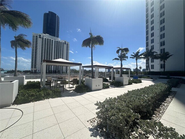 Building Photo - 18911 Collins Ave