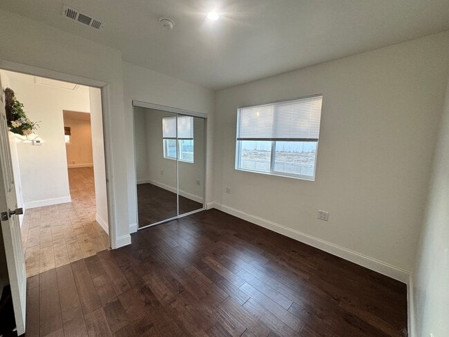 Building Photo - 7842 Woodlake Ave