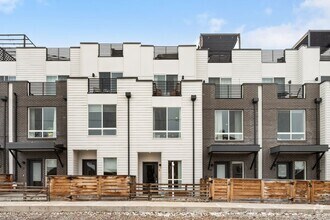 Building Photo - Modern 2-Bedroom Rowhome with Rooftop Moun...