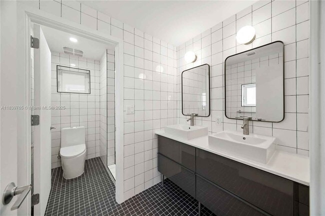 Building Photo - Northwest 9th Court, Miami, FL 33127 - 5 BR 3 BA townhouse