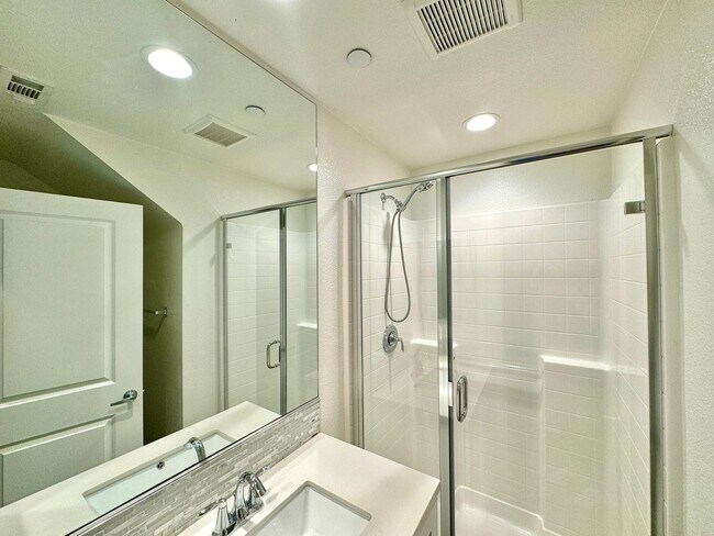 Building Photo - Spacious 4BD/3.5BA Townhome in Oceanside with Community Pool, 2-Car Garage & Covered Balcony