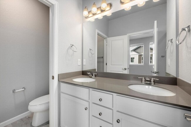 Building Photo - Gorgeous NEW Three Story Townhome with two car attached garage!