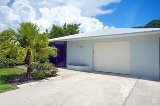 Building Photo - Annual Rental - 2 Bedroom + Den Home with ...