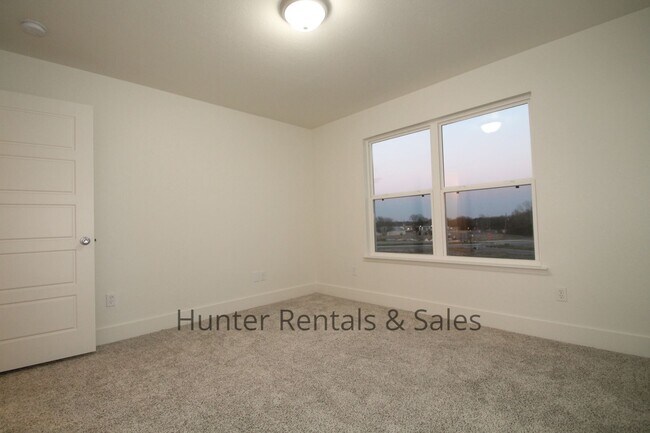 Building Photo - Upscale Four-Bedroom Townhome!