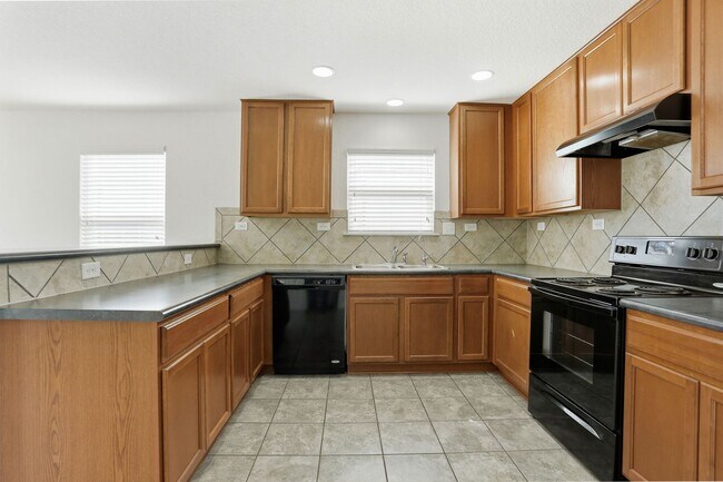 Building Photo - Spacious 4-Bedroom Home with Flexible Floor Plan in Growing West San Antonio