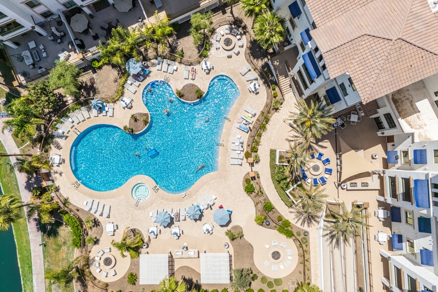 Resort-style pool, spa, poolside lounge areas, multiple fire pits and grills. - 2511 W Queen Creek Rd