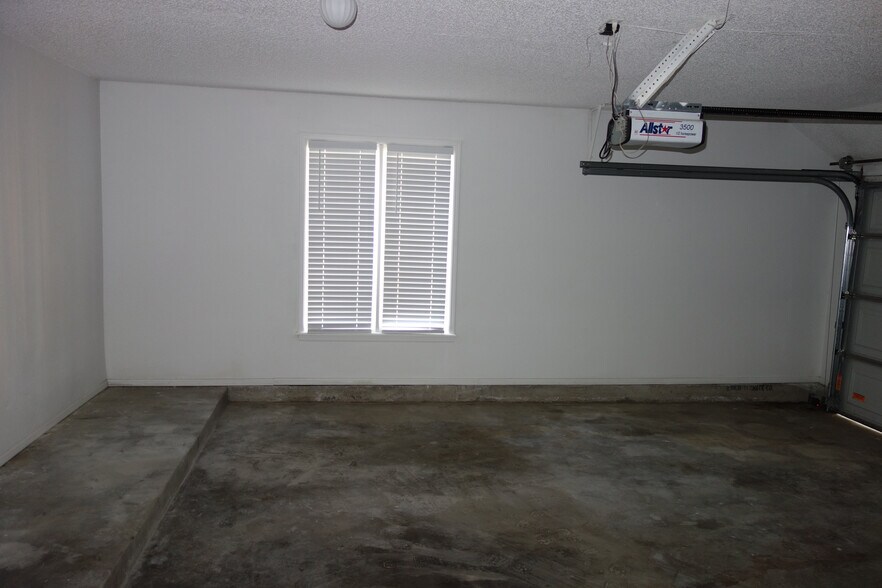 Spacious 2-car automatic garage - 7116 S Indianapolis Ave