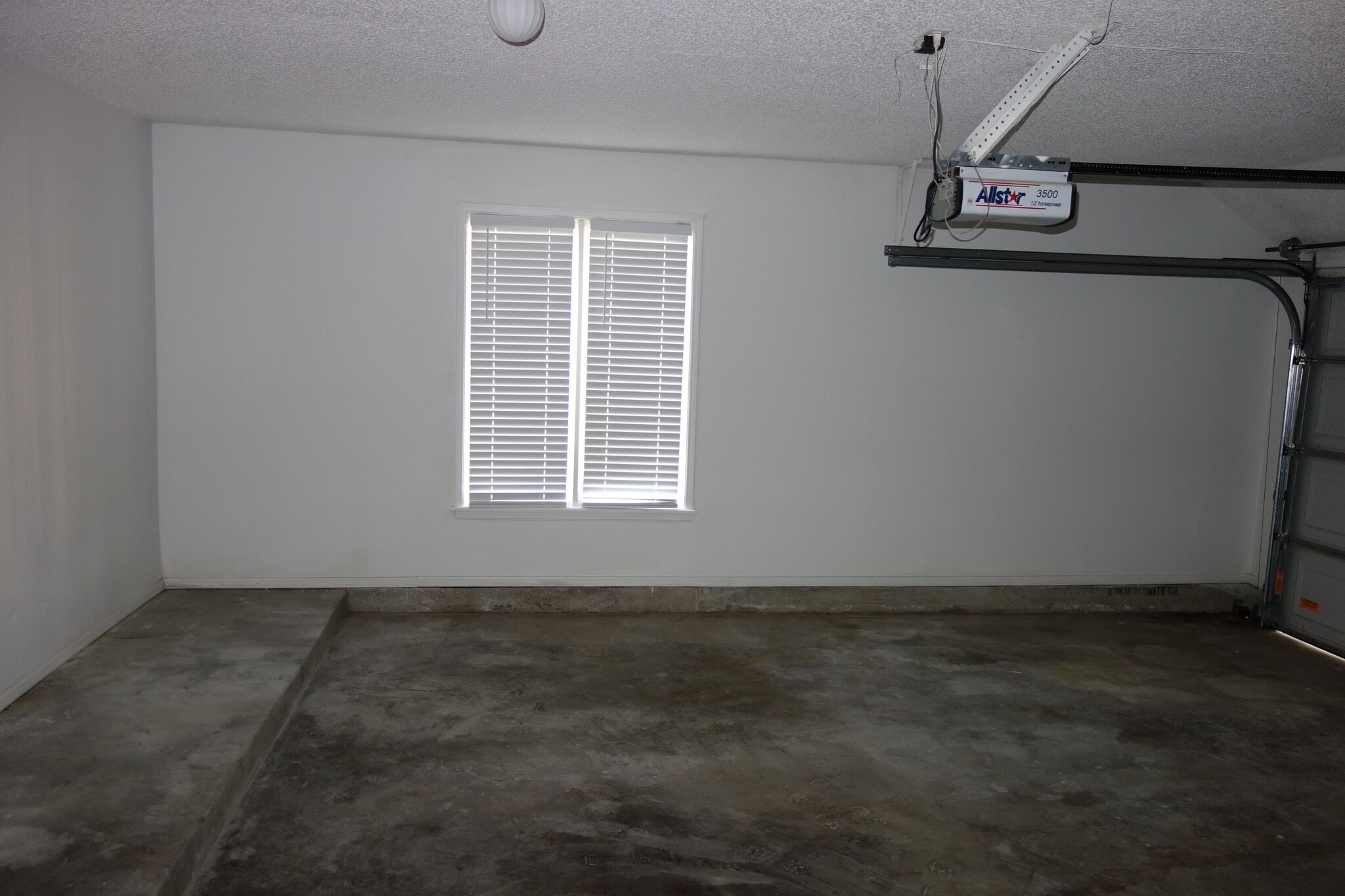Spacious 2-car automatic garage - 7116 S Indianapolis Ave