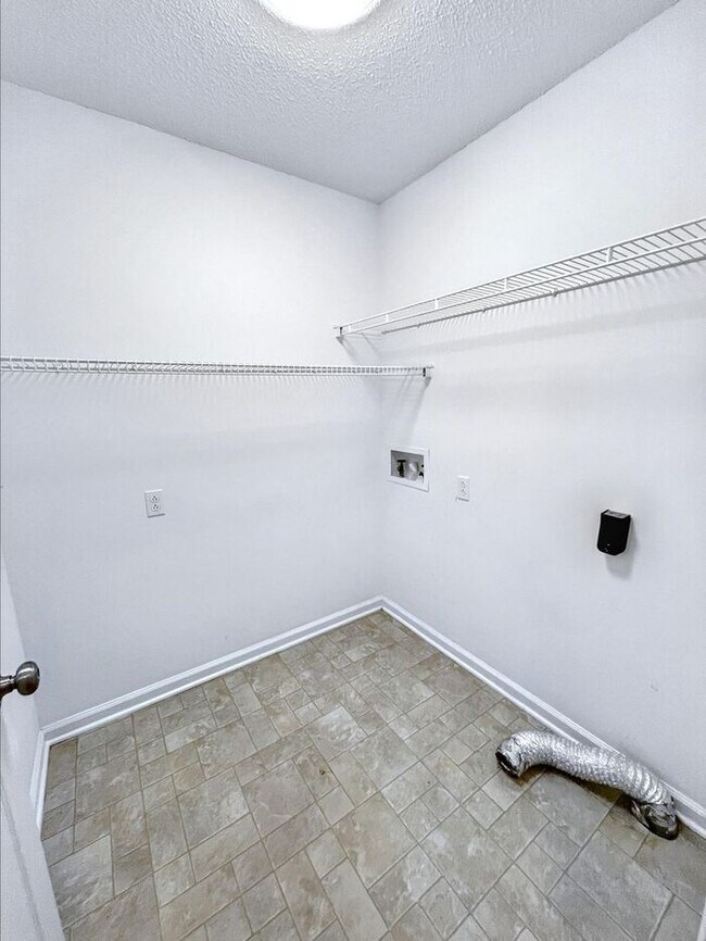 Building Photo - Spacious 3-Bedroom Home with Deck, Firepla...