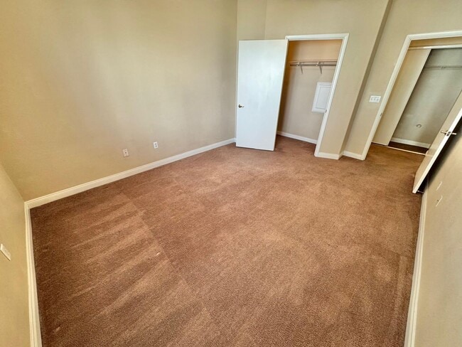 Building Photo - SPACIOUS 1 BEDROOM, 1 BATH GROUND-FLOOR CONDO IN THE GATED TERRASANTA COMMUNITY.