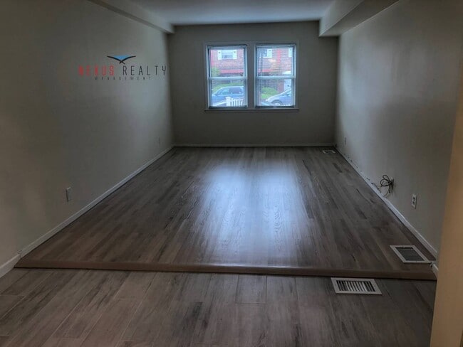 Building Photo - 225-01 59th Ave