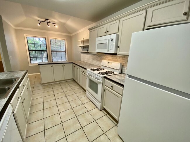 Building Photo - Easy Living, Inside and Out