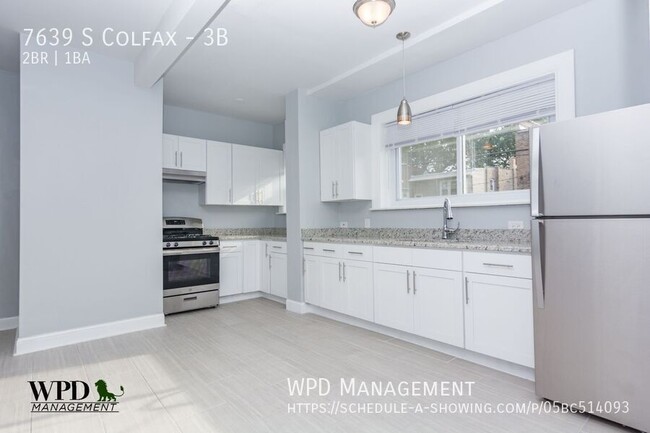 Building Photo - 7639 S Colfax-3B