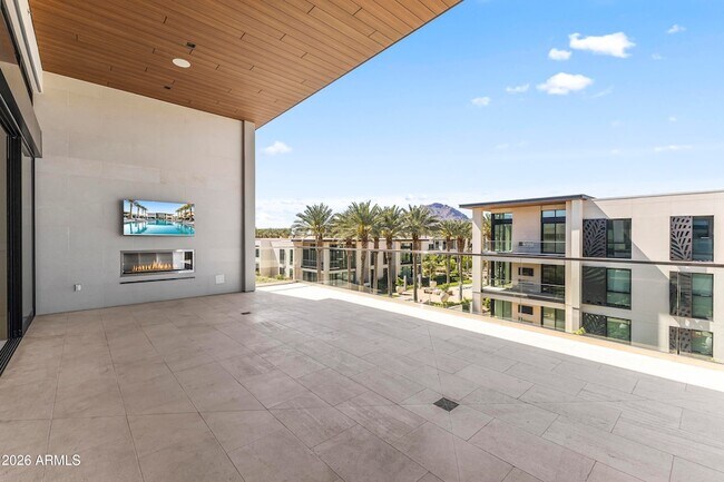 Building Photo - 6587 N Palmeraie Blvd