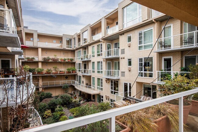 Building Photo - Sweet + secure 1/1 condo with parking, extra storage room + AC available now!