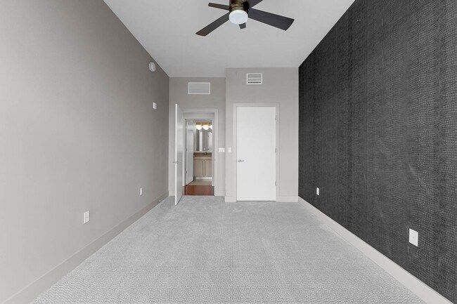 Building Photo - “Sleek Design Meets Walkable Downtown Livi...