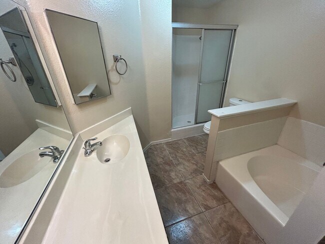 Building Photo - BEAUTIFULLY RENOVATED HOME WITH NEW PAINT, CARPET, AND LIGHT FIXTURES