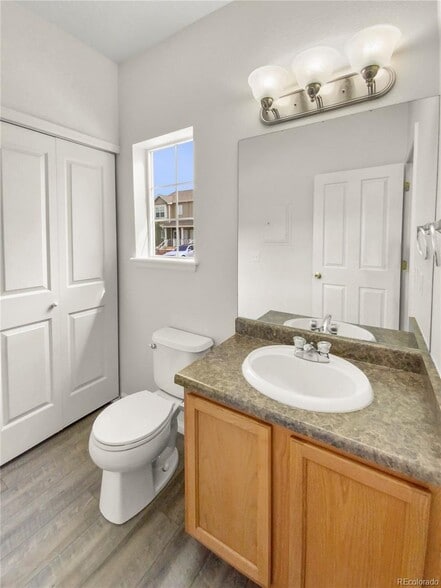 Powder room and washer/dryer on main floor - 14700 E 104th Ave