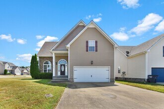 Building Photo - Pet Friendly Three Bedroom with Bonus!