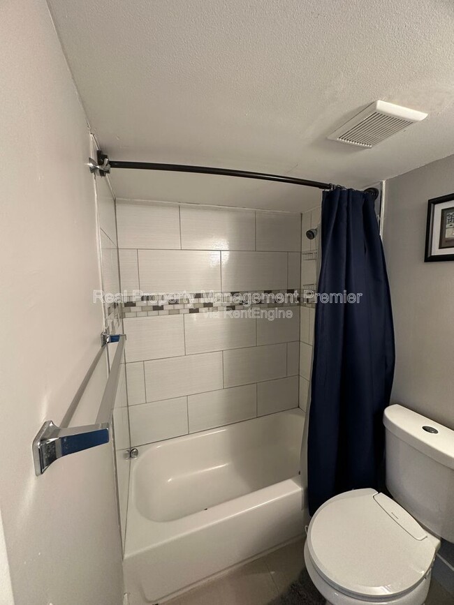 Building Photo - 9491 Palm Cir S