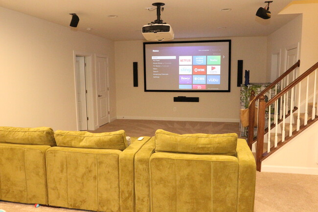 Huge 120" projection movie theater. Connections available for 5.1 Surround Sound. Great for movie nights and big games! - 681 Fielding Run Dr