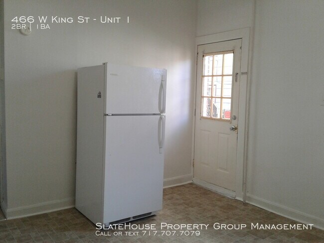 Building Photo - First floor two bedroom with yard!