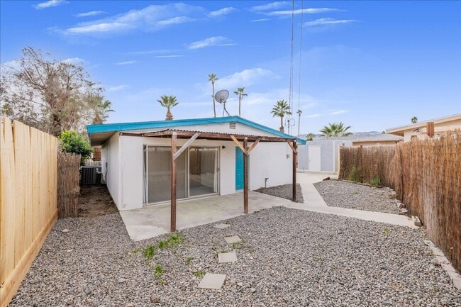 Building Photo - 3 Bed / 2 Bath Home with Two-Car Garage, Laundry and a Storage Shed/Work Space