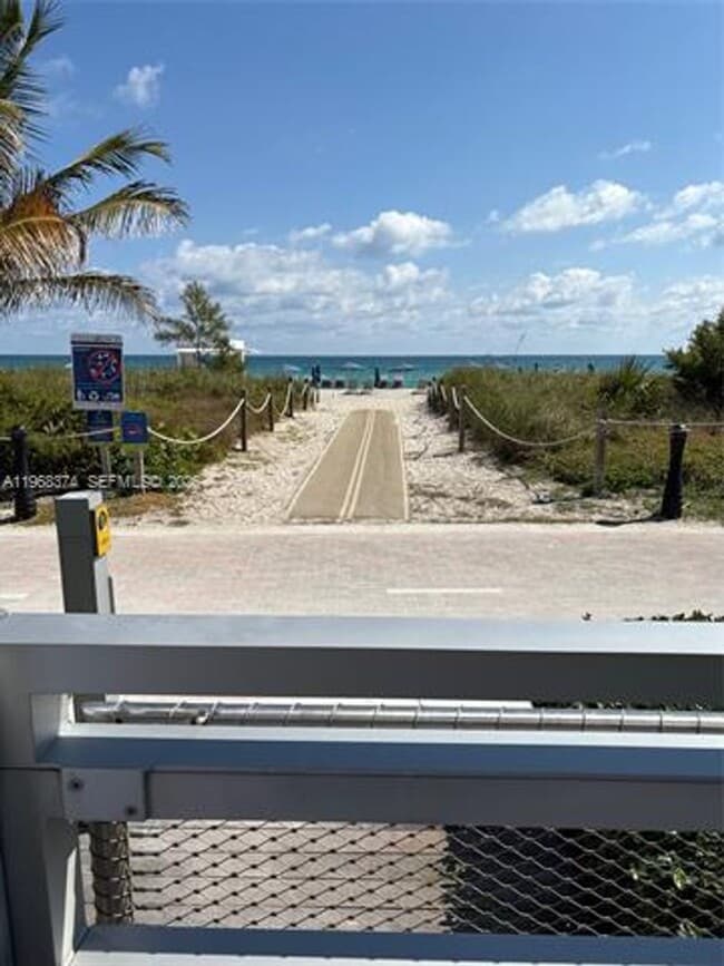 Building Photo - 8701 Collins Ave