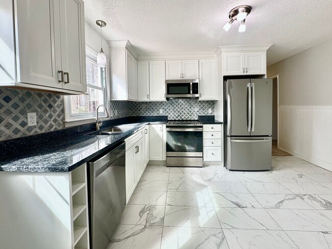 Building Photo - Updated 3BR Ranch | Large Lot, Deck & Modern Finishes – Minutes to Durham