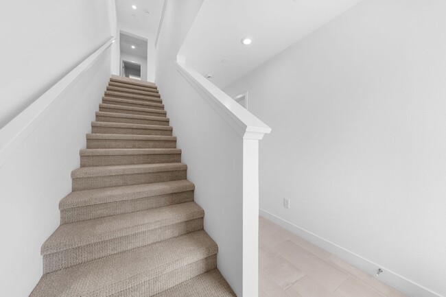 Building Photo - Available now! Brand New 4 Bedroom Townhom...