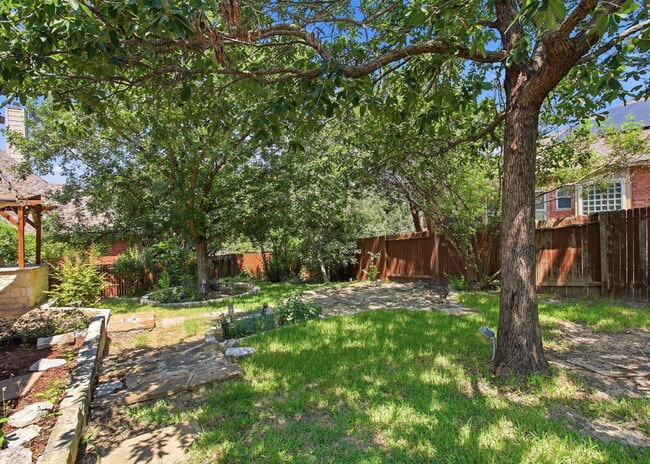 Building Photo - Updated two story. Gated subdivision. Gorgeous patio and yard!