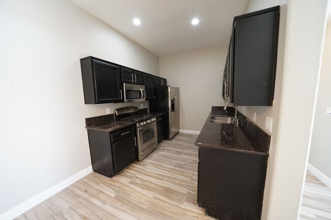 Building Photo - SHOWINGS AVAILABLE NOW