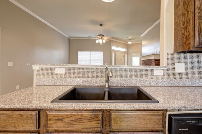 Building Photo - Spacious 4-Bedroom Home with Modern Upgrad...