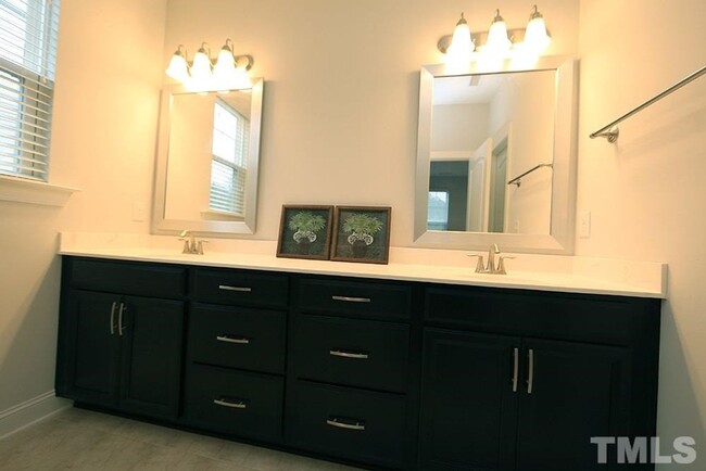 Building Photo - Main Floor Owner's Suite PLUS Main Floor G...