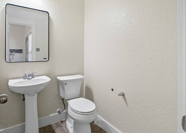 Building Photo - Discover the perfect blend of comfort and space at 6323 Myrtle.