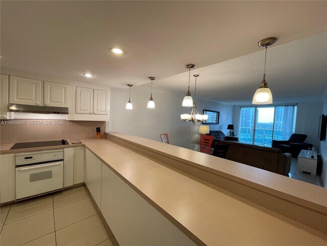 Building Photo - 19390 Collins Ave