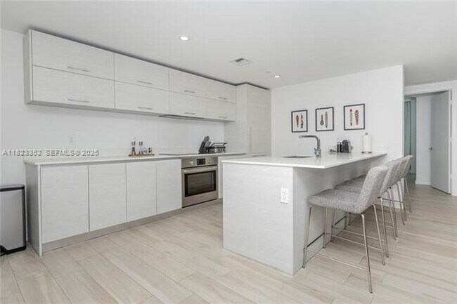 Building Photo - 1300 S Miami Ave