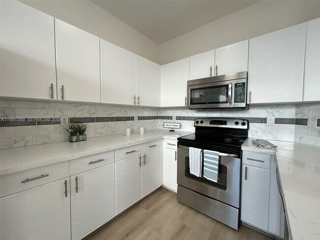 Building Photo - 12515 SW 124th Path