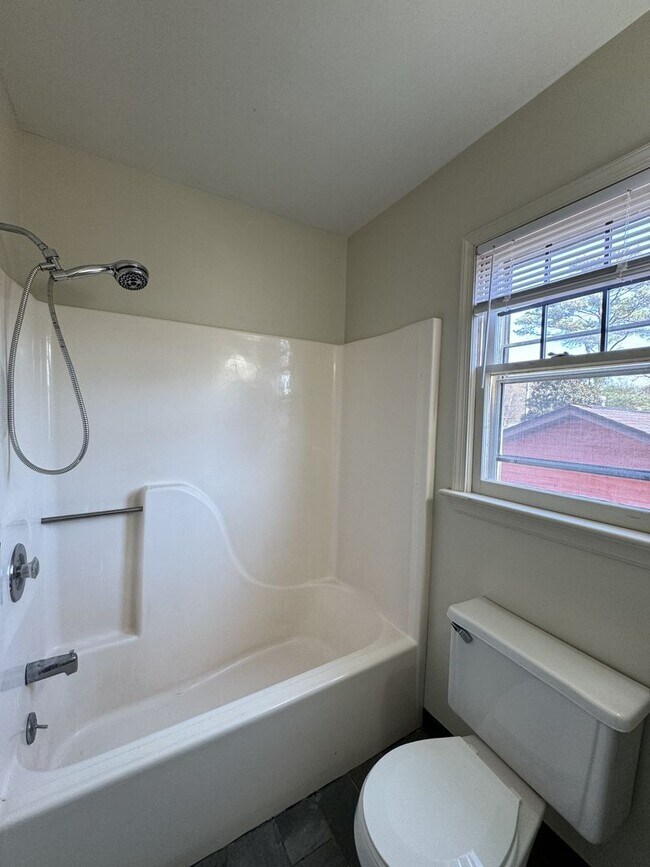 Building Photo - Introducing a charming Colonial style home...