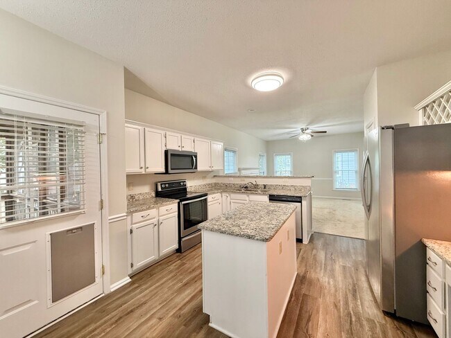 Building Photo - **OFFERING WAIVED APPLICATION FEES & $200 ...